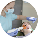 Dental expert works on patient's teeth